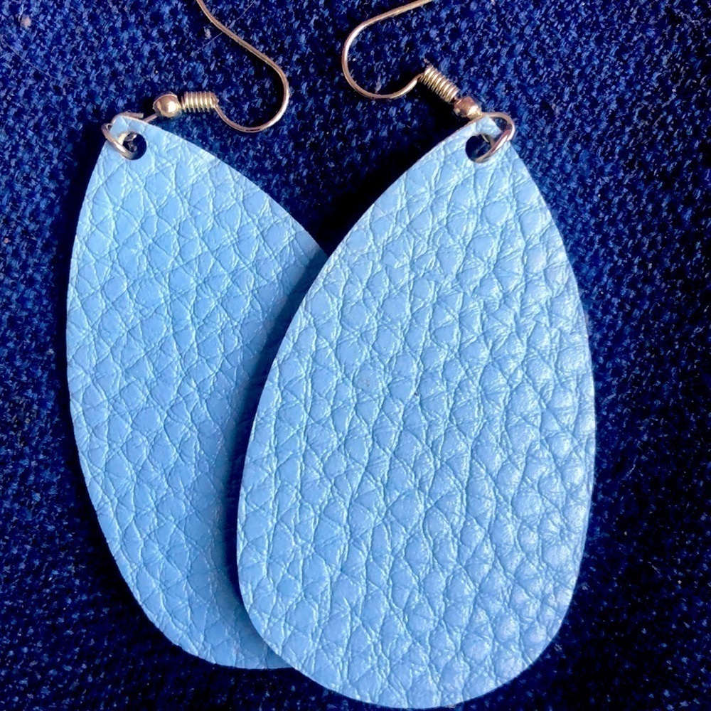 Blue “leather” dangle earring.